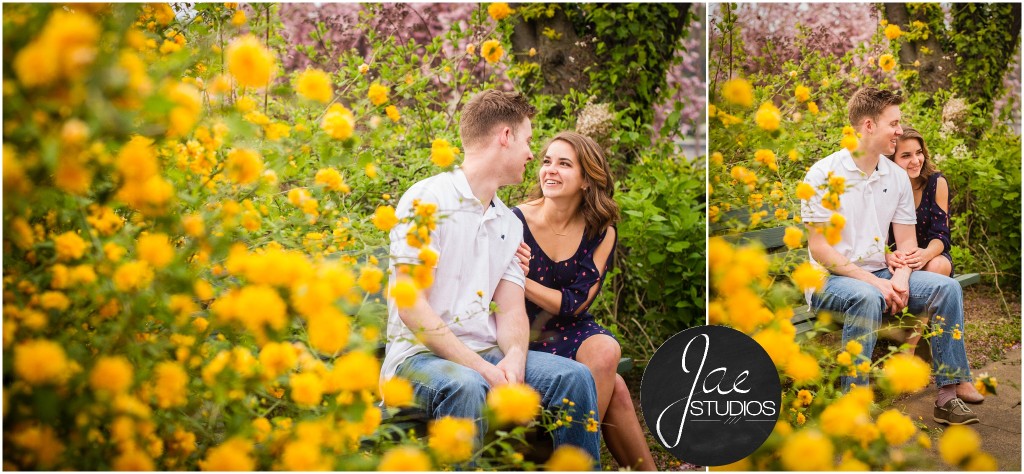 Hannah & Nick-47, Lynchburg Couple Session, Yellow Flowers, Cherry Blossoms, White Shirt, Jeans, Blue Patterned Dress, Sitting