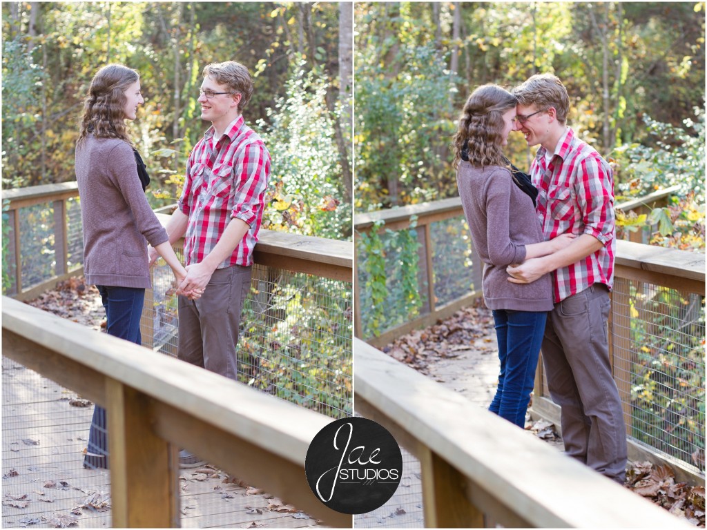 Lynchburg Engagement Patrick and Rebecca. Embracing on an aged bridge in the woods.